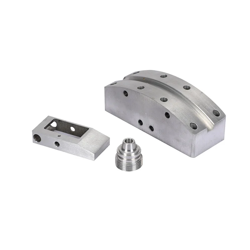 Milled stainless steel blocks and a small turned component