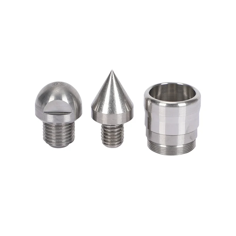 Turned stainless steel nozzle tips and a threaded sleeve