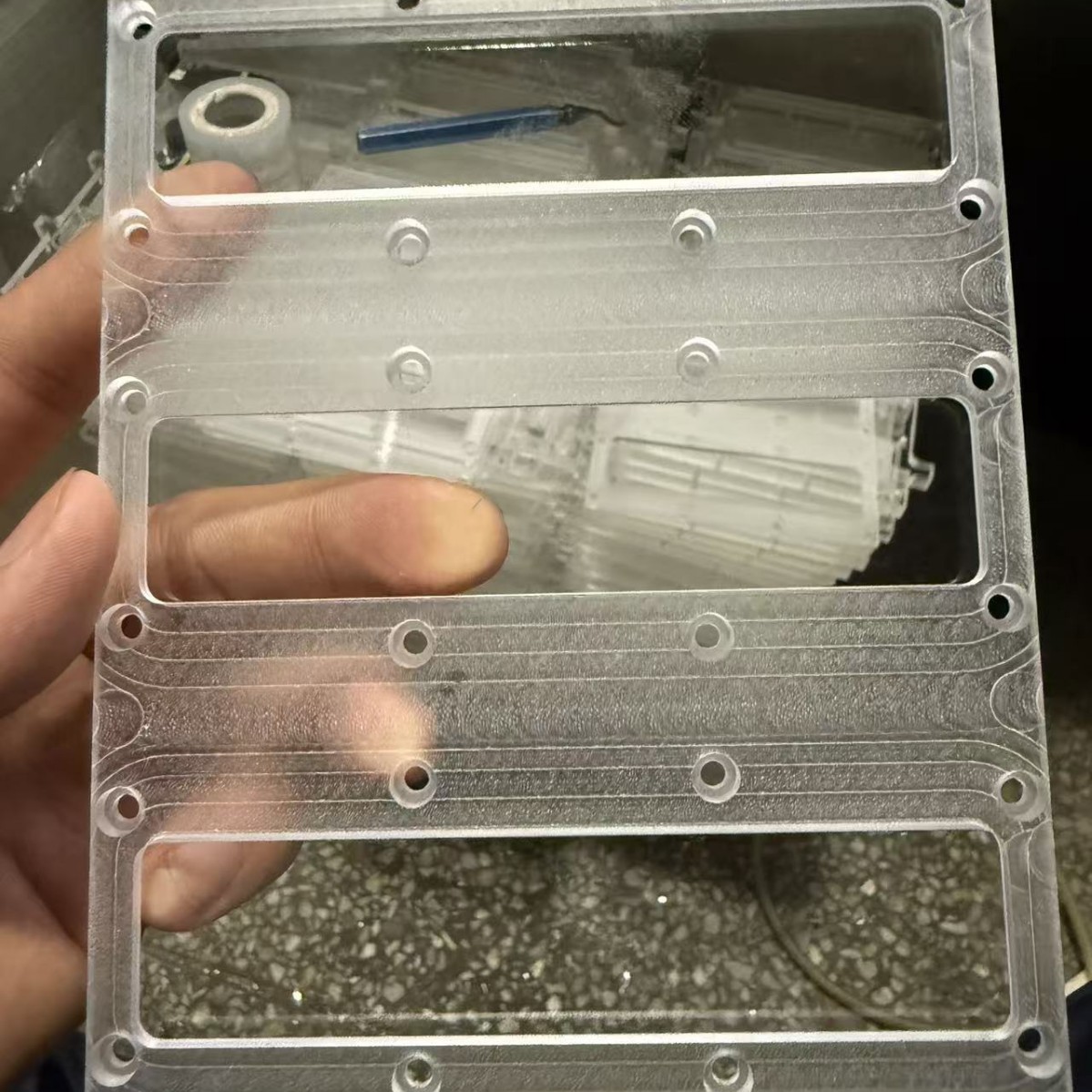 Machined PC plate, drilled — Polycarbonate (PC), CNC machined at GY Machining