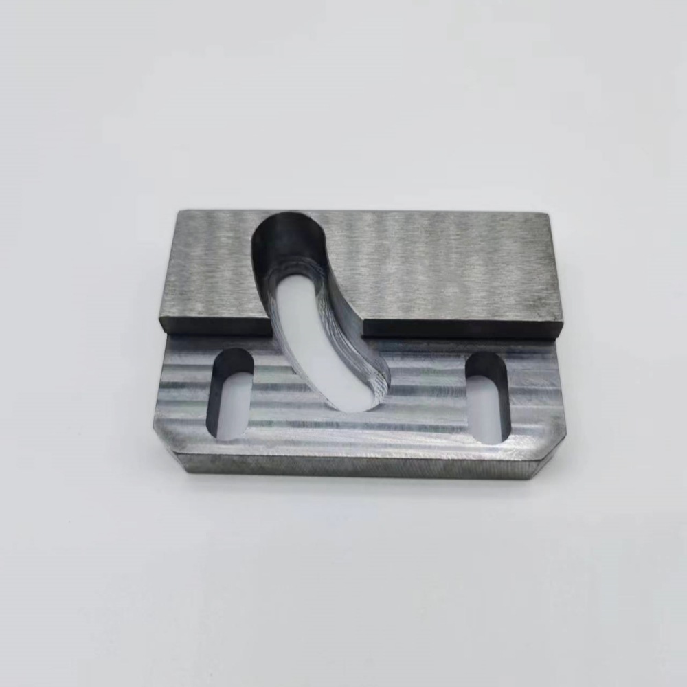 CNC turned and milled stainless steel composite part with a curved slot, machined by GY Machining