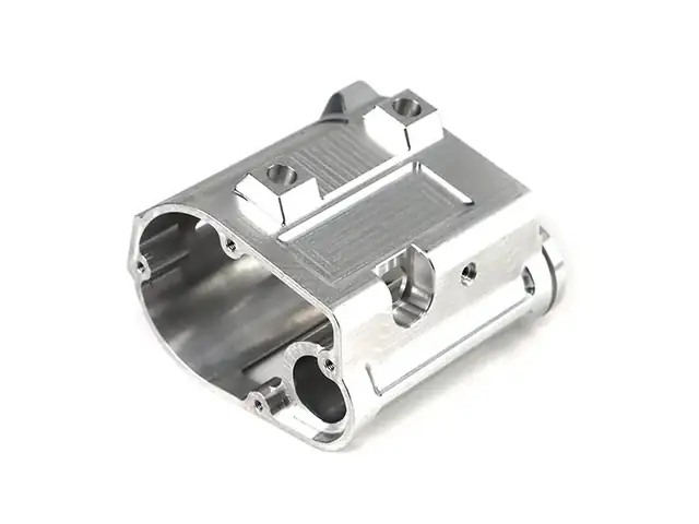 Aluminium block with bored ID and milled slots, machined in one setup on a four-axis centre