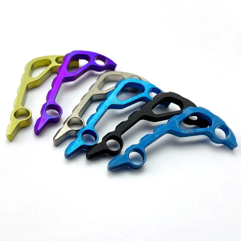 Six anodised titanium pry tools in a range of colours