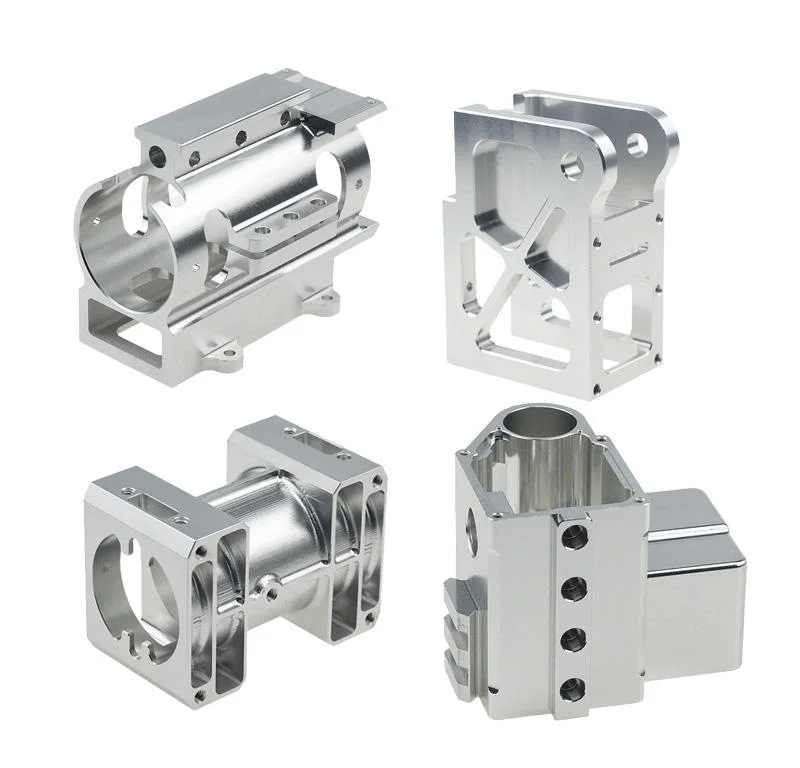 Set of four CNC machined aluminium brackets, clamp housings and mounts, milled by GY Machining
