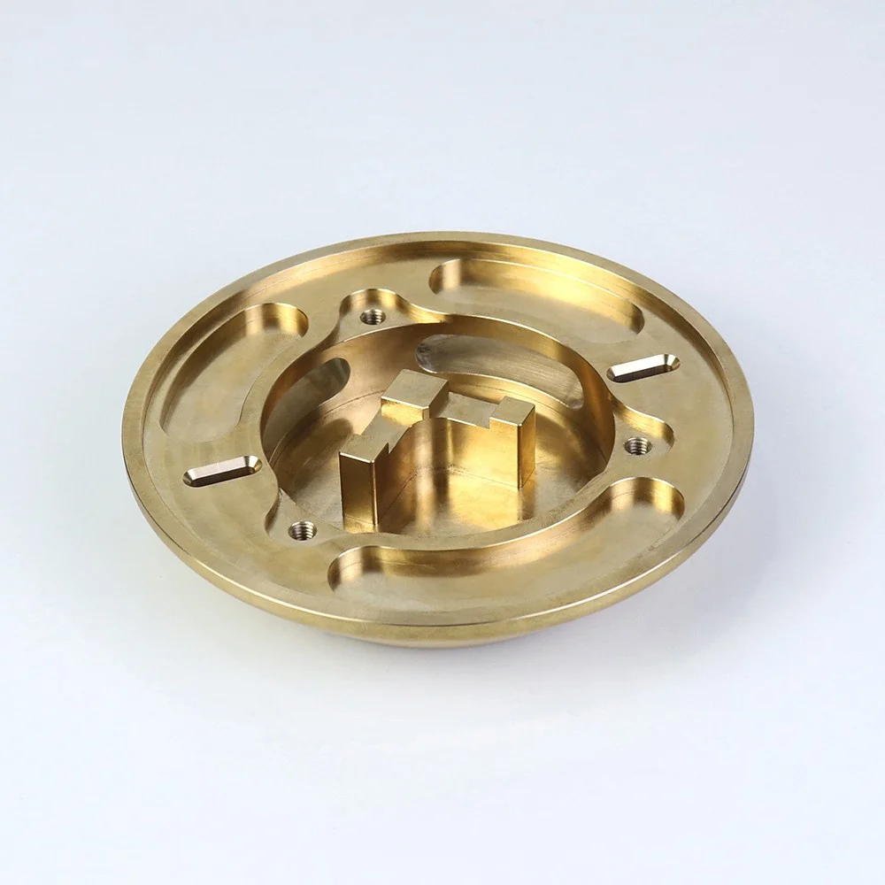 CNC machined brass disc plate with a recessed pocket, milled slots and tapped holes &ndash; GY Machining