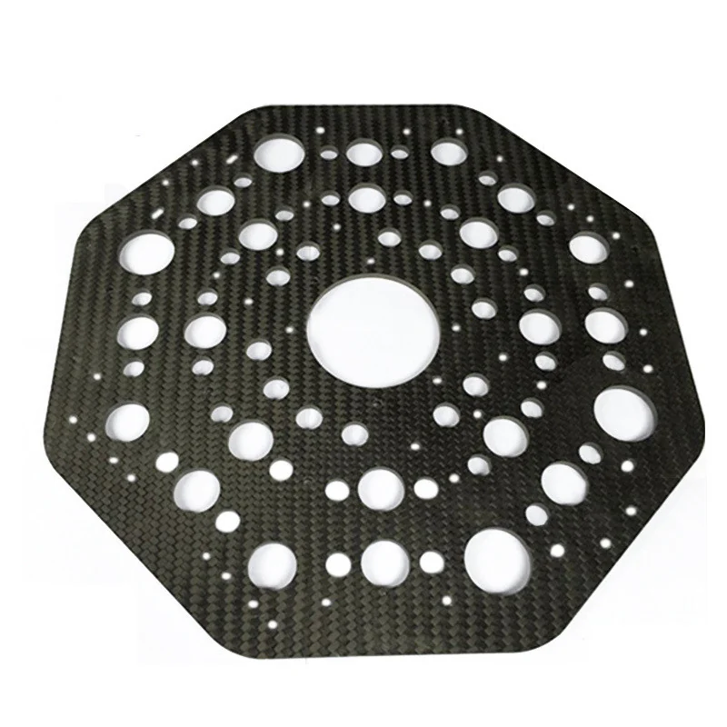 CNC machined carbon fibre octagonal plate with a drilled hole pattern