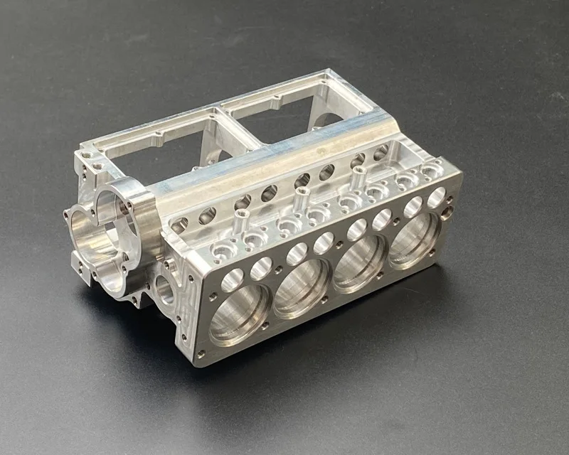 CNC milled aluminium four-cylinder engine block model, machined by GY Machining for an automotive customer
