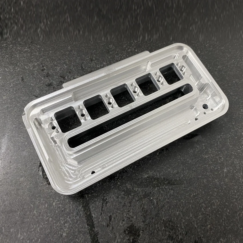 CNC milled aluminium panel plate with five windows and a slot – GY Mac