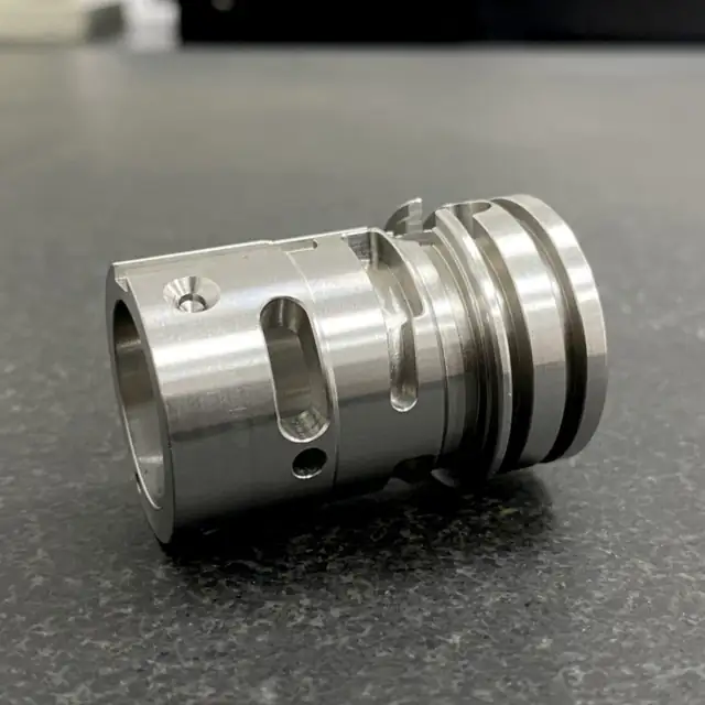 CNC turned and milled stainless steel sleeve with external grooves, mi