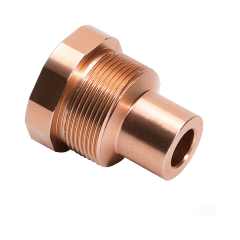 CNC machined copper hex-head adapter with external thread and a stepped bore, machined by GY Machining
