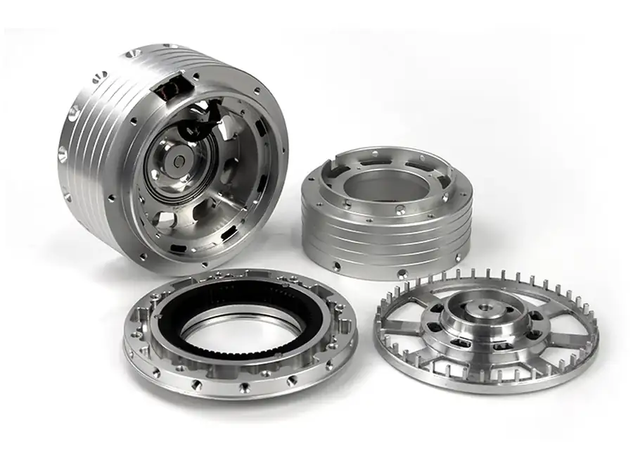 Machined aluminium housings, rings and a slotted disc produced at GY Machining in Dongguan