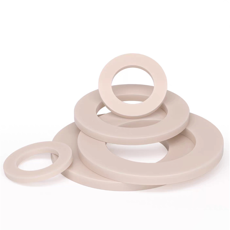 Machined PEEK rings and washers in four sizes — PEEK, CNC machined at GY Machining