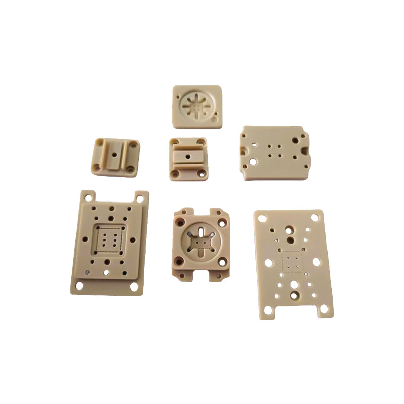 Machined PEEK plates and mounting blocks, mixed batch — PEEK, CNC machined at GY Machining
