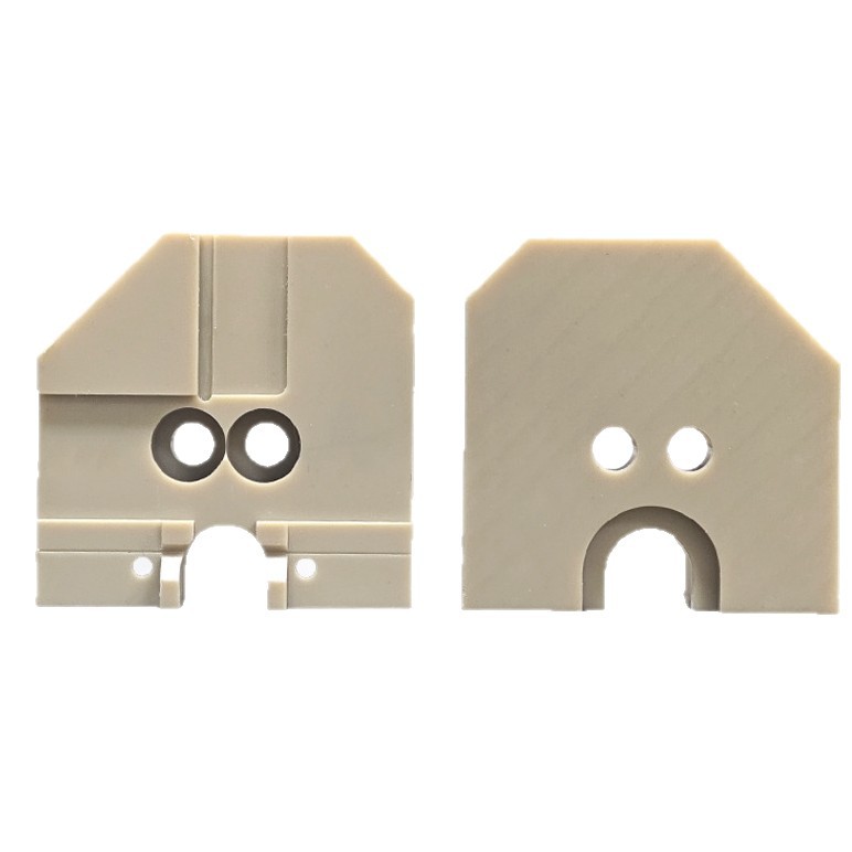 Machined PEEK end plates, front and back faces