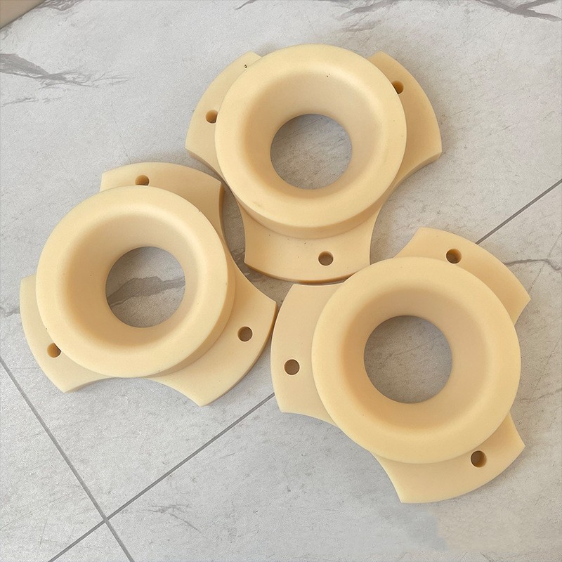 Machined nylon flanged bearing housings with bolt holes