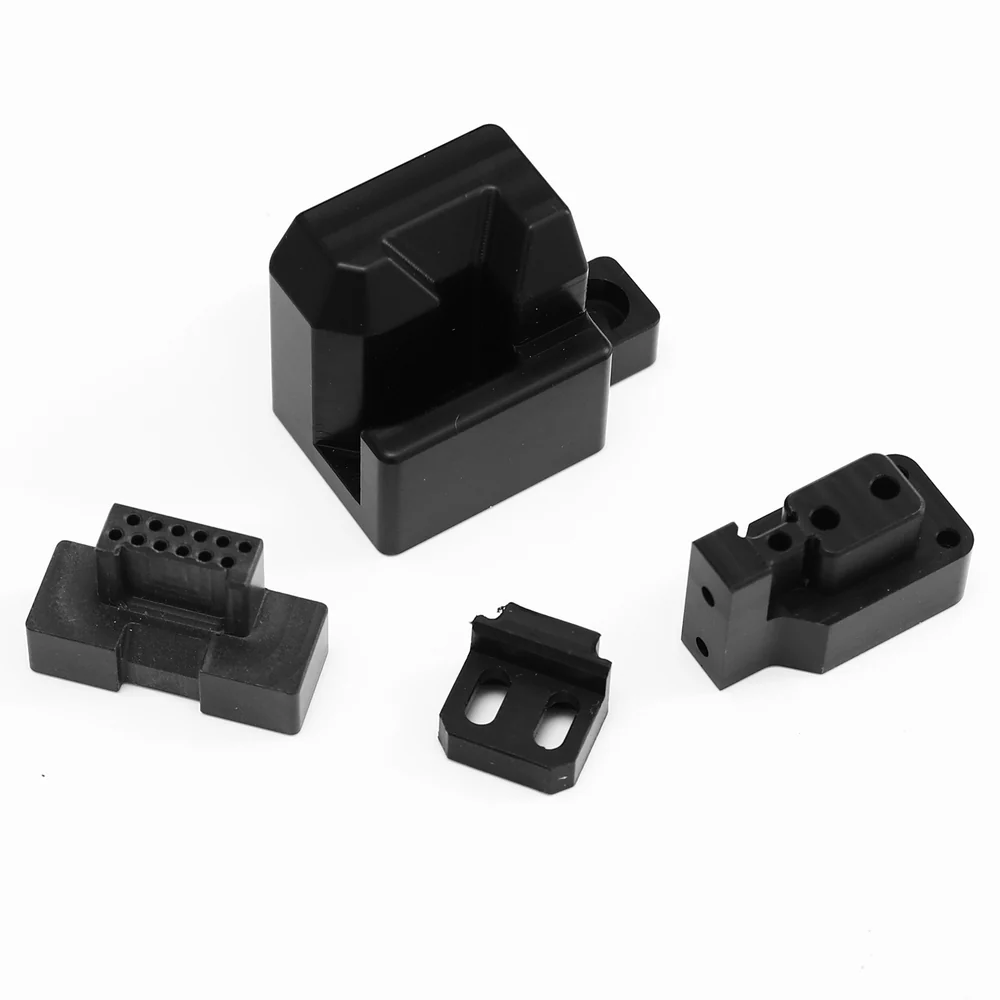 Connector housings, a terminal block and mounting clips – GY Machining