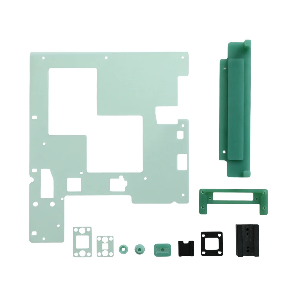 Cut G10 panel with spacers, brackets and small insulating parts &ndash; GY Machining