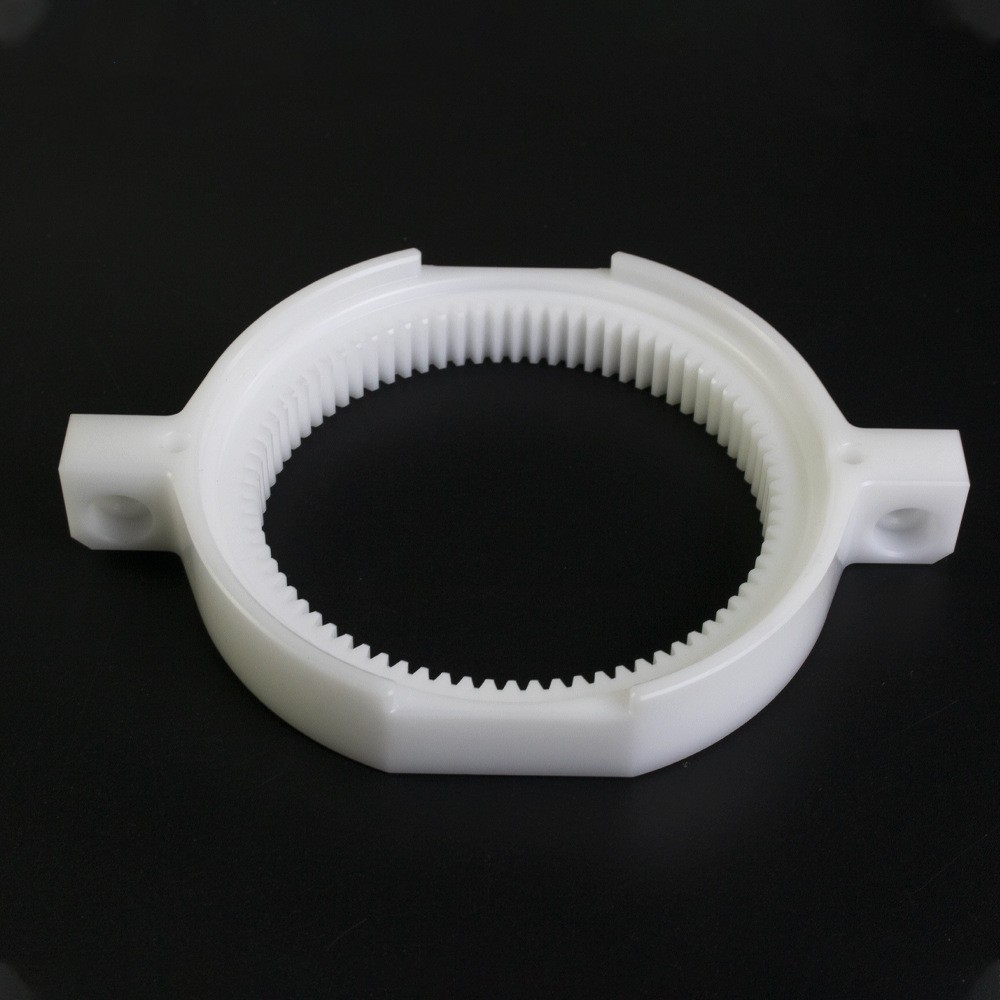 CNC machined natural Delrin internal ring gear with mounting lugs