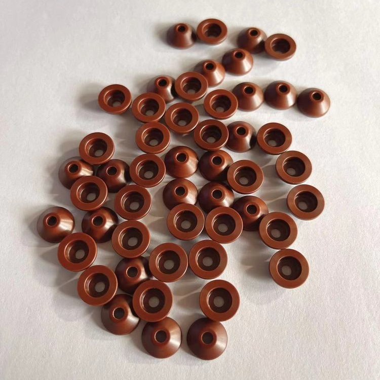CNC machined polyimide cone seats and washers