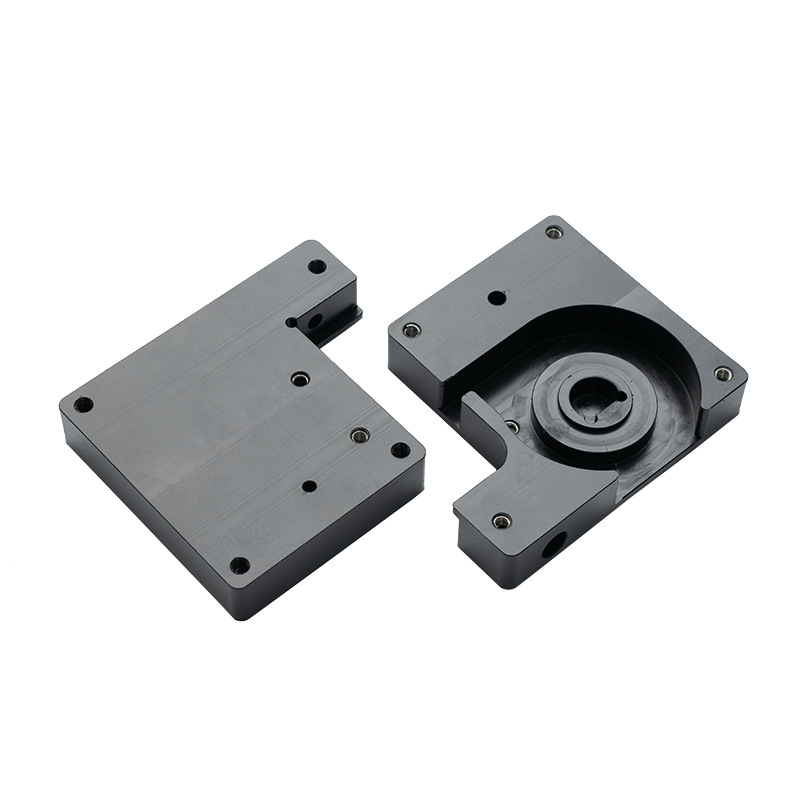 CNC machined POM housing halves with a bearing recess