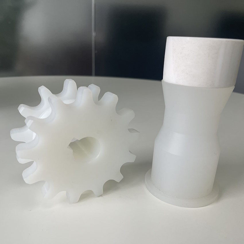 CNC machined PP sprocket and stepped bushing
