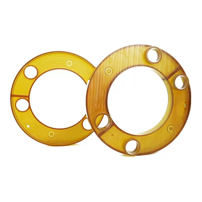CNC machined Ultem rings with bores