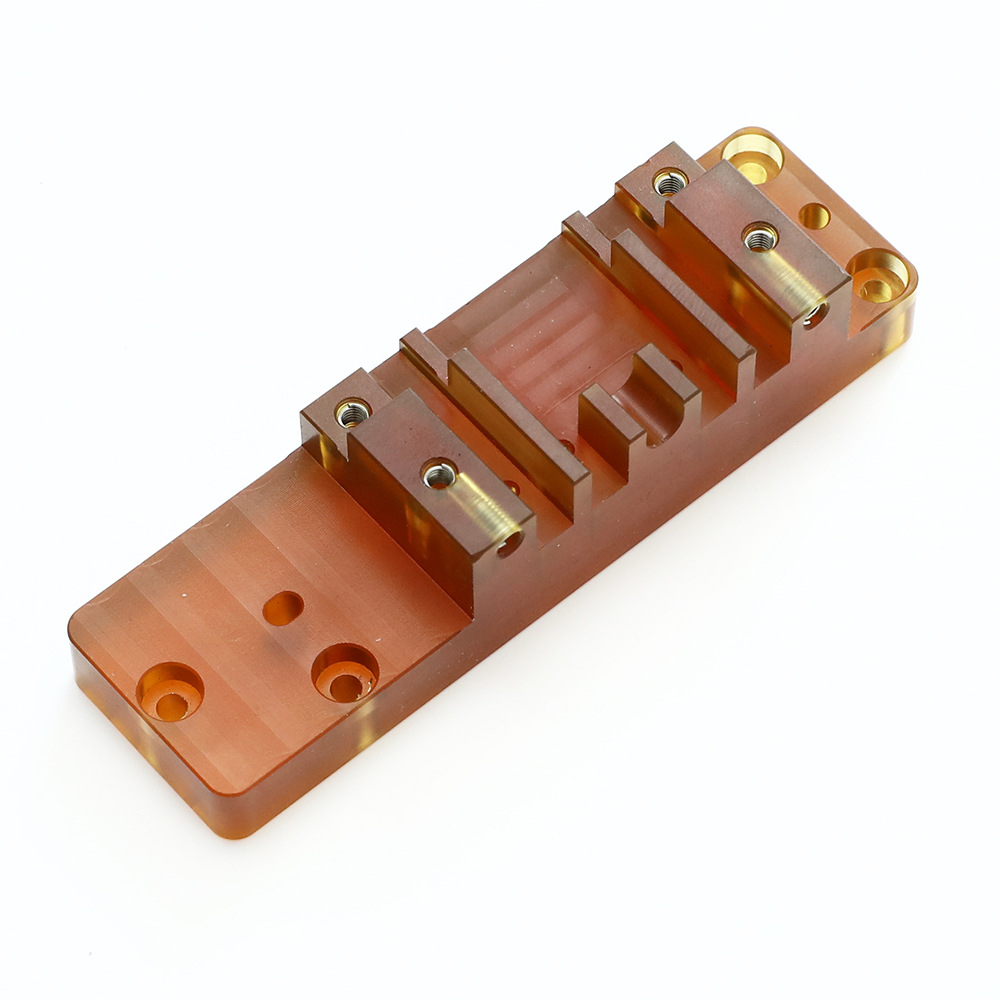 CNC machined Ultem stepped fixture plate