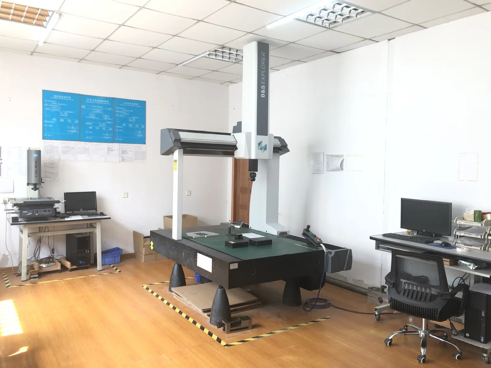 The measuring room at GY Machining, with bridge CMM and inspection benches