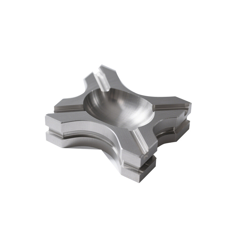 Milled four-arm bracket with spherical pocket, as-machined