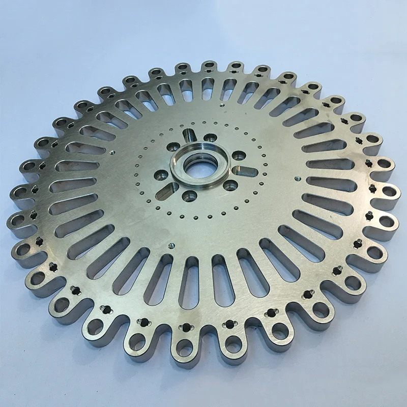 Slotted stainless index disc with radial slots and hole pattern – GY Machining