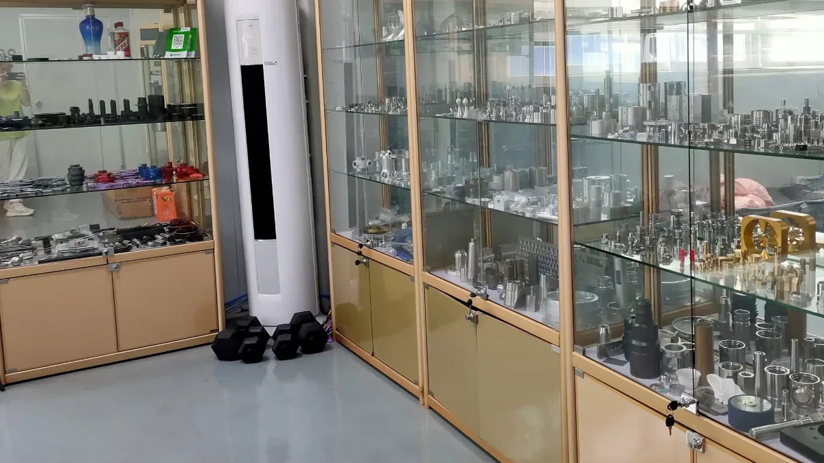 Stainless steel CNC turned sleeves, caps, fittings and threaded parts in the GY Machining sample cabinet