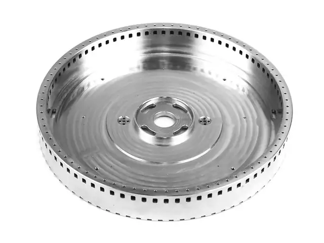Turned aluminium disc with radial slots, indexed on the rotary table