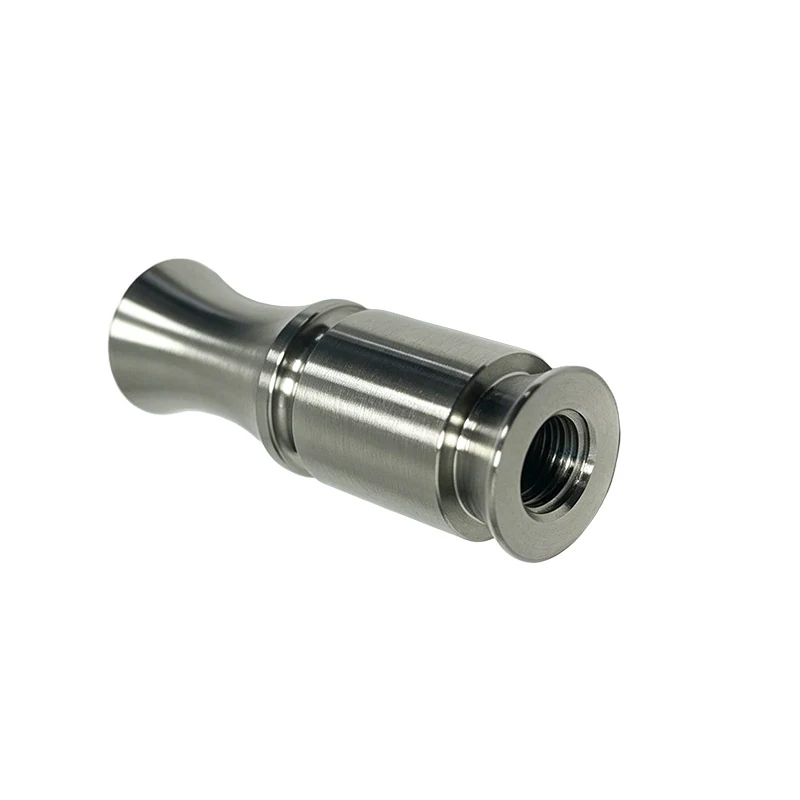 Turned stainless steel waisted sleeve with a threaded bore and relief grooves
